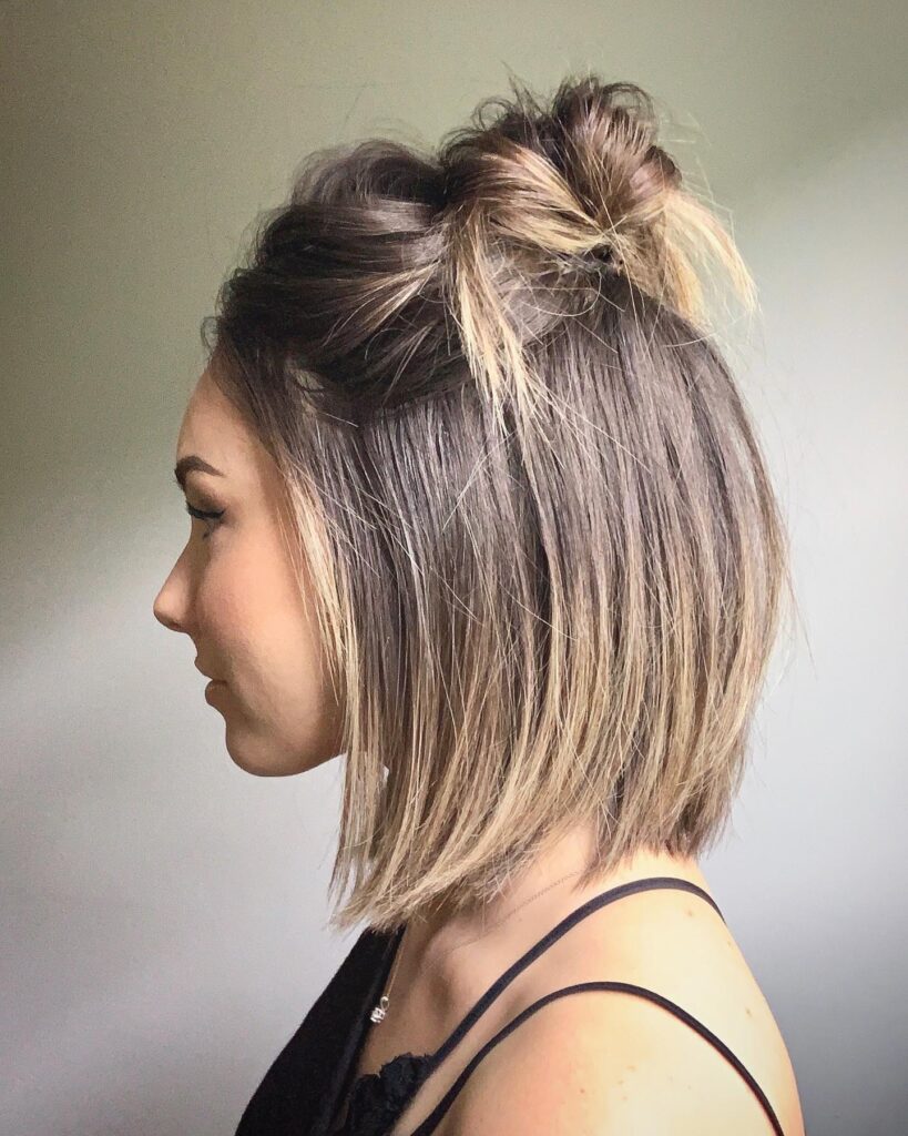 17 Easy Back to School Hairstyles for Girls of All Ages 13 Half-Up Spicy Bun