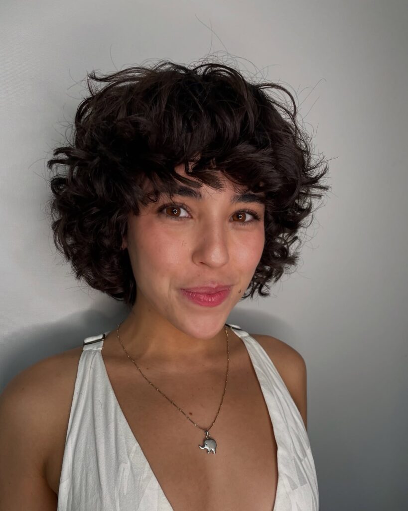 Top 14 Messy Hairstyles for Busy Mornings 11 Curly Bob with Tousled Bangs