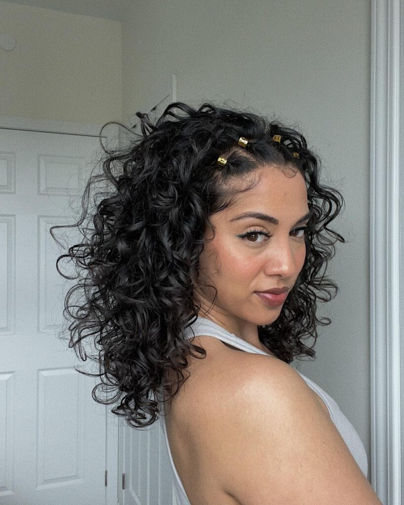 12 Quick Summer Vacation Hairstyles You Can Do in Minutes 5 Curly Half-Up with Gold Cuffs