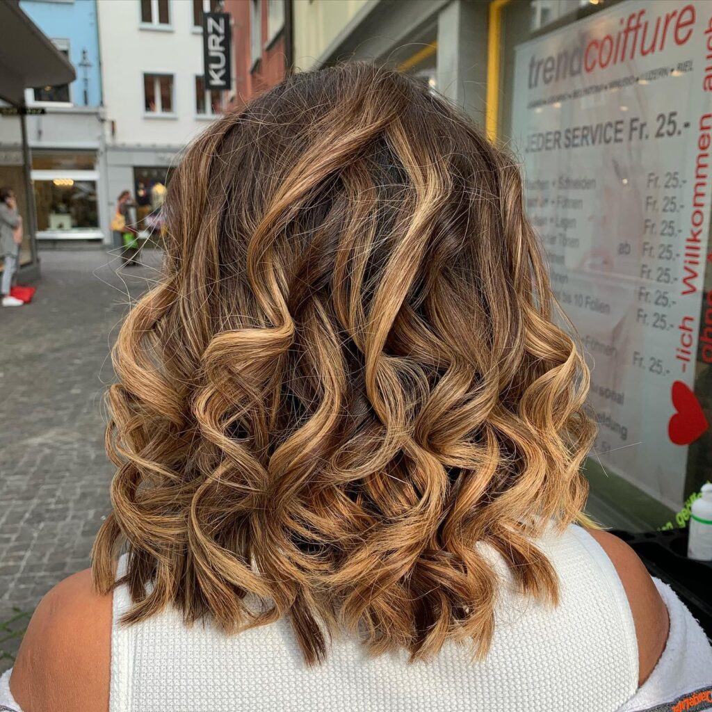 8 Curly Hair Trends You’ll See Everywhere in 2025 5 Balayage Loose Spiral Curls