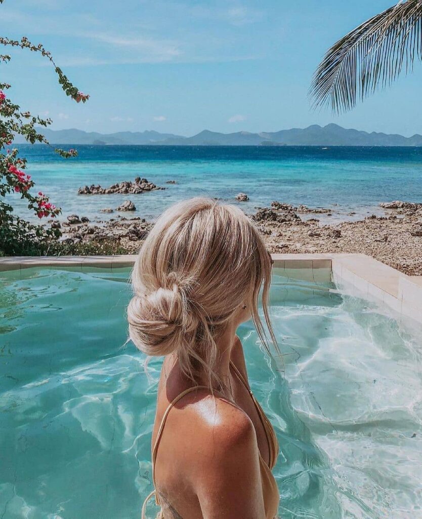 12 Quick Summer Vacation Hairstyles You Can Do in Minutes 3 Messy Low Bun