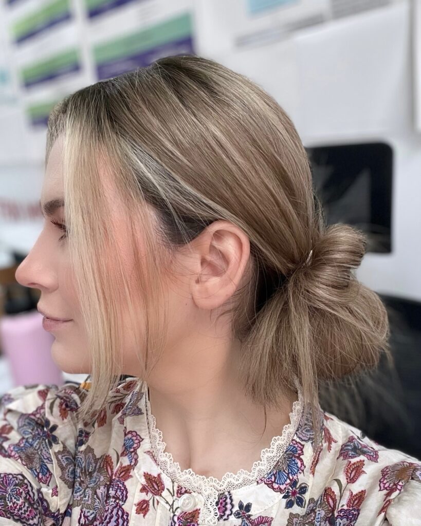 8 Gorgeous Hairstyles for Thin Hair That Add Body 1 Messy Low Bun