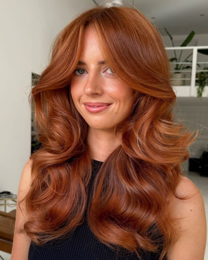 9 70s Feathered Hair Trends for Modern Days 1 Copper Feathered Layers