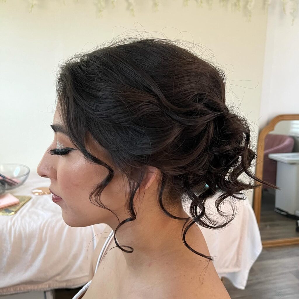 8 Gorgeous Hairstyles for Thin Hair That Add Body 3 Romantic Curled Low Updo