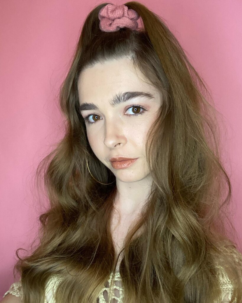 8 Gorgeous Hairstyles for Thin Hair That Add Body 5 Half-Up Voluminous Waves with Scrunchie
