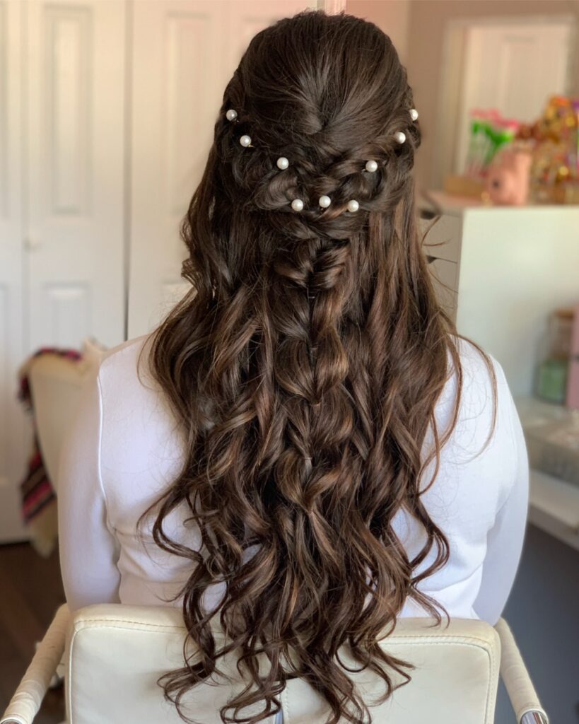 12 Best Wedding Hairstyles in 2025: From Chic Updos to Flowing Waves 3 Pull-Through Braid Half Updo